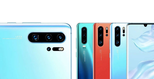 Close-up of Leica triple camera smartphones in blue, green, red, and pastel colors with sleek modern design
