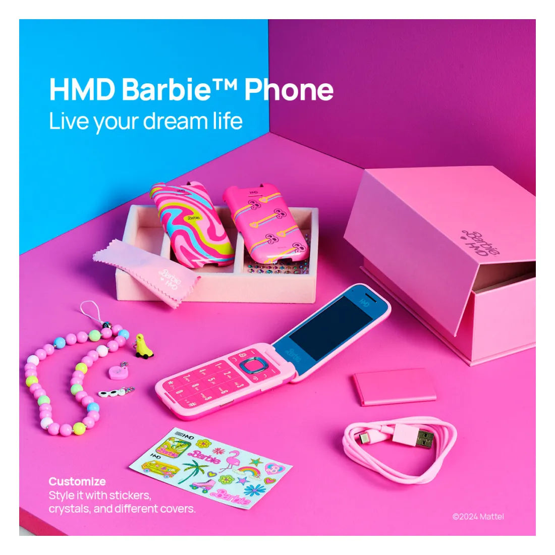 HMD Barbie Flip Phone retail packaging and accessories displayed
