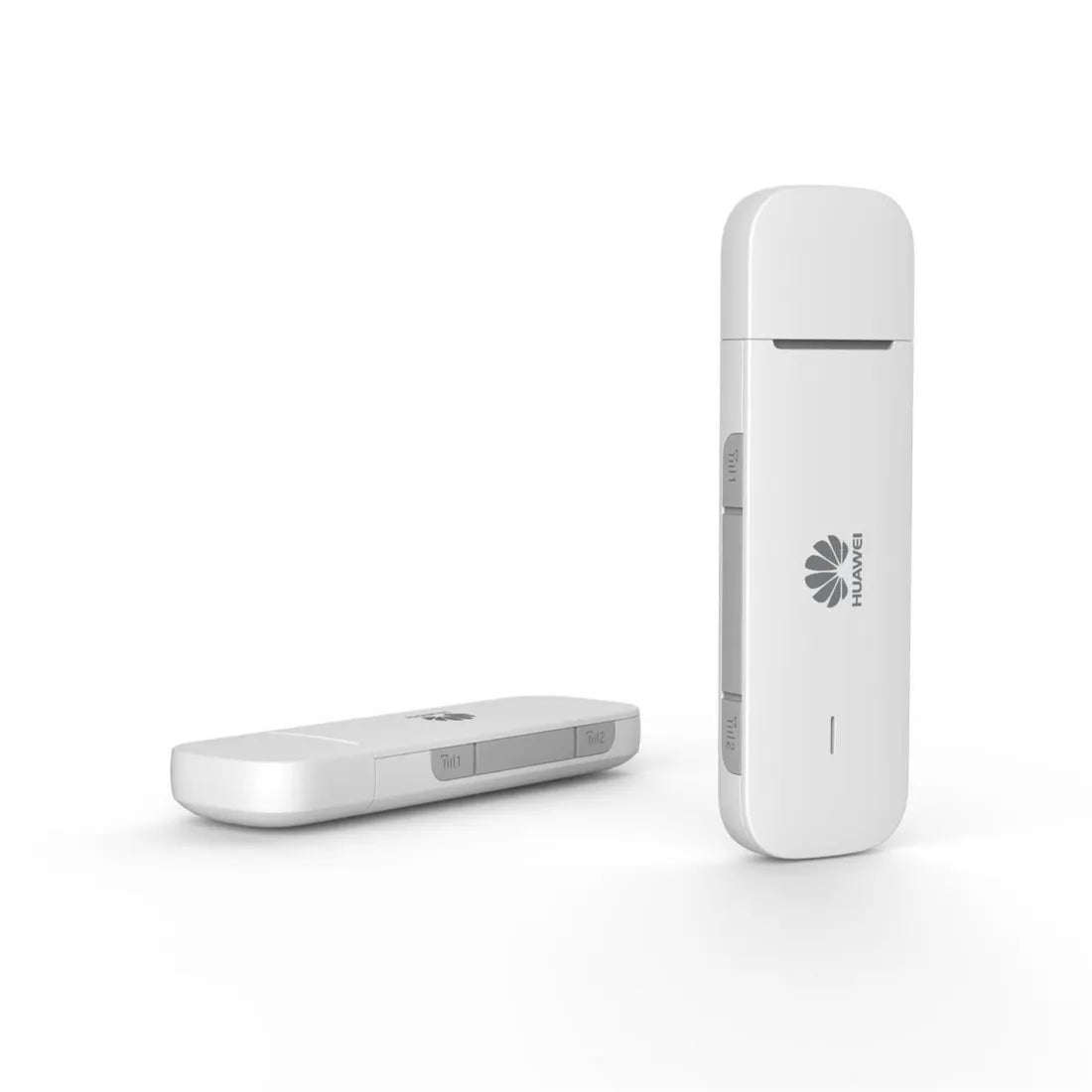 Huawei E3372 4G USB mobile broadband dongle shown standing upright and lying flat